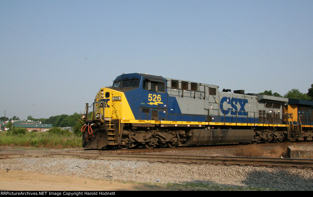 CSX 526 leads train Q776 across the "A" line at Maple